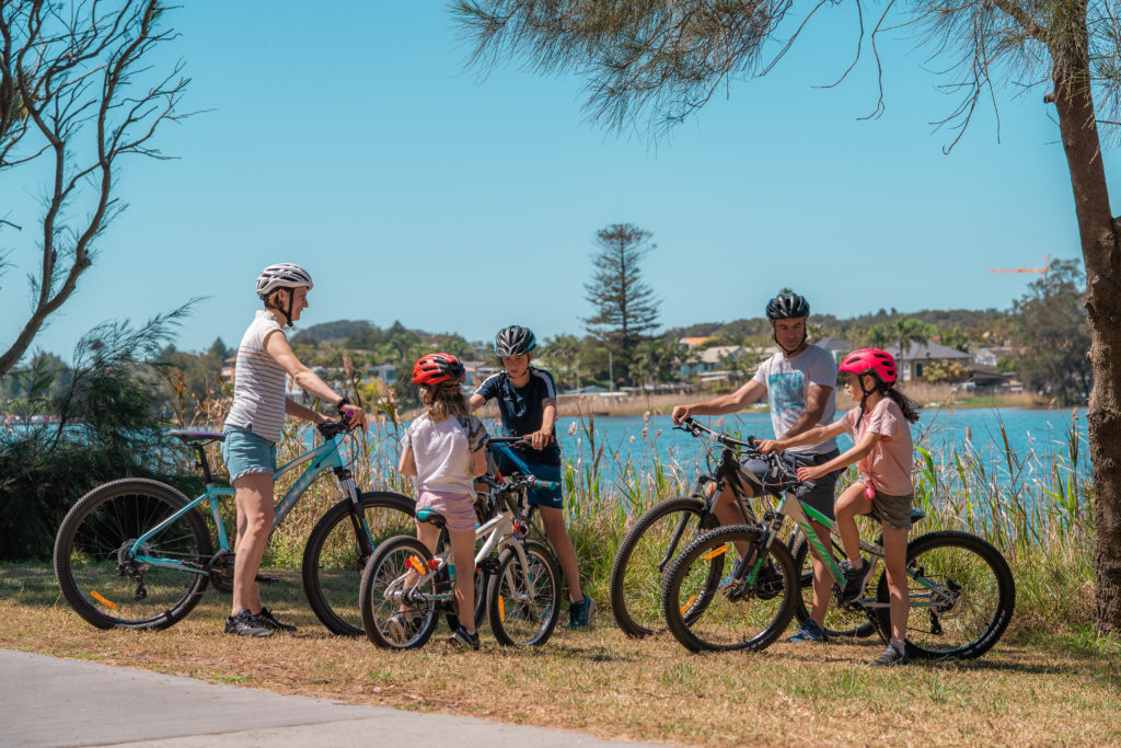 Family stopping for a rest whilst on cycling tour