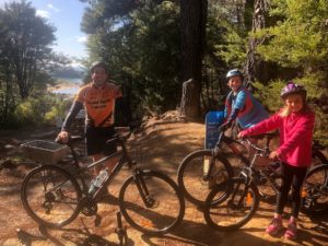 Family at Kaiteriteri mountain bike park resting spot